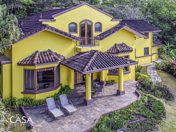 Drone view of yellow home in Panama
